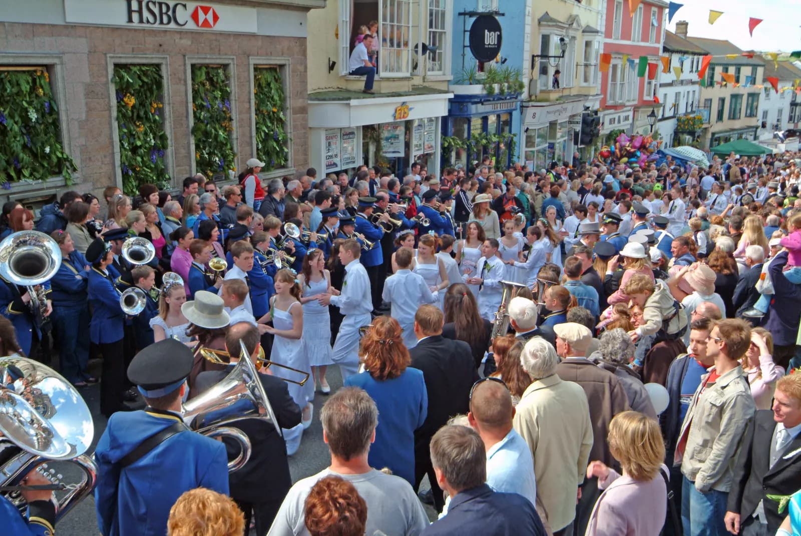 The children's dance going up Coinagehall Street to the Guildhall on flora day, Helston, Cornwall