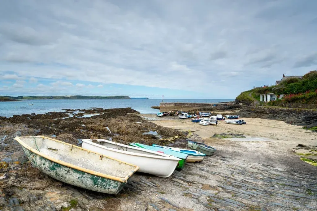 Boat at low tide in Portscatho Harbour, Cornwall