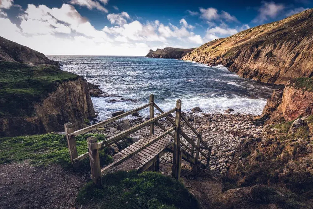 Access to Nanjizal, Cornwall, via wooden steps, Cornwall, overlooking the beach