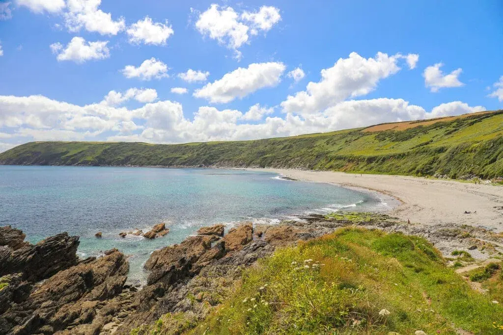 A panoramic view of Vault Beach on the Roseland Peninsular in Cornwall