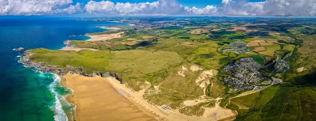 A birds eye view of Holywell Bay Beach, near Newquay, Cornwall at summer