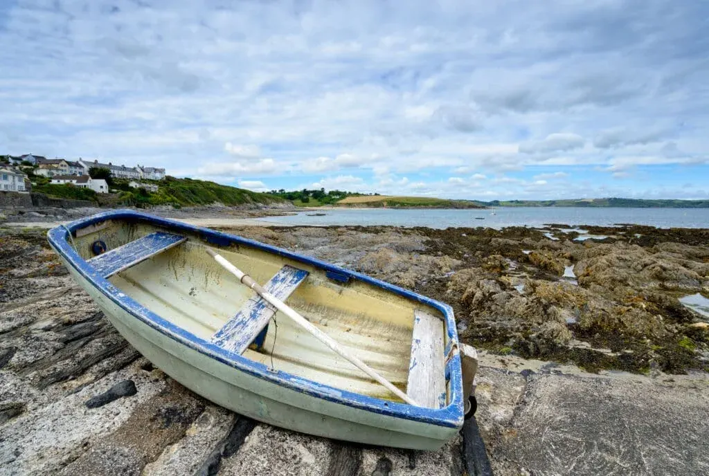 A dinghy on the beach at Portscatho, Cornwall