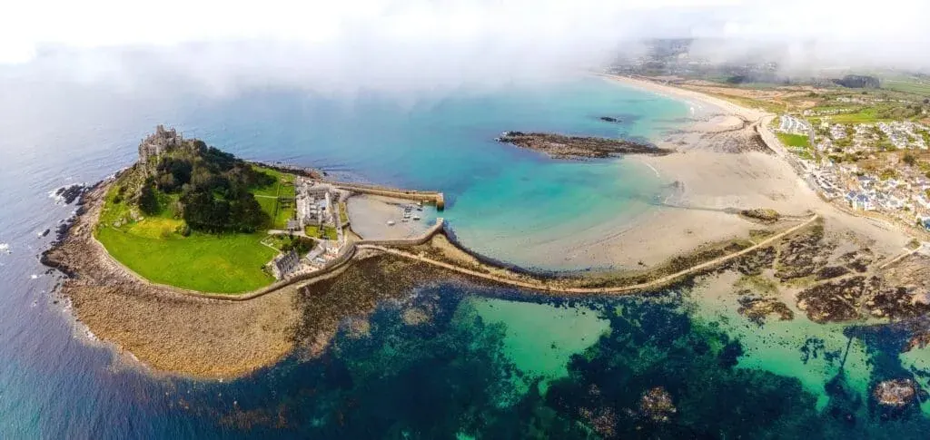 An aerial photograph of Marazion Beach and St Michael’s Mount, Penzance, Cornwall